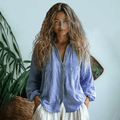 Women's relaxed long sleeve V-neck shirt with decorative front trim and buttons
