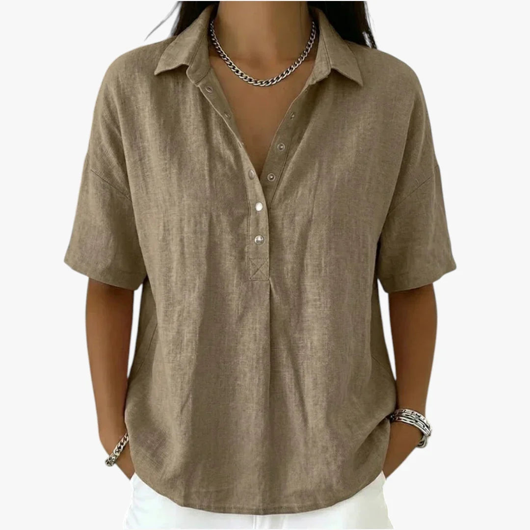 Women's oversized short sleeve collared blouse with button front and rounded hem