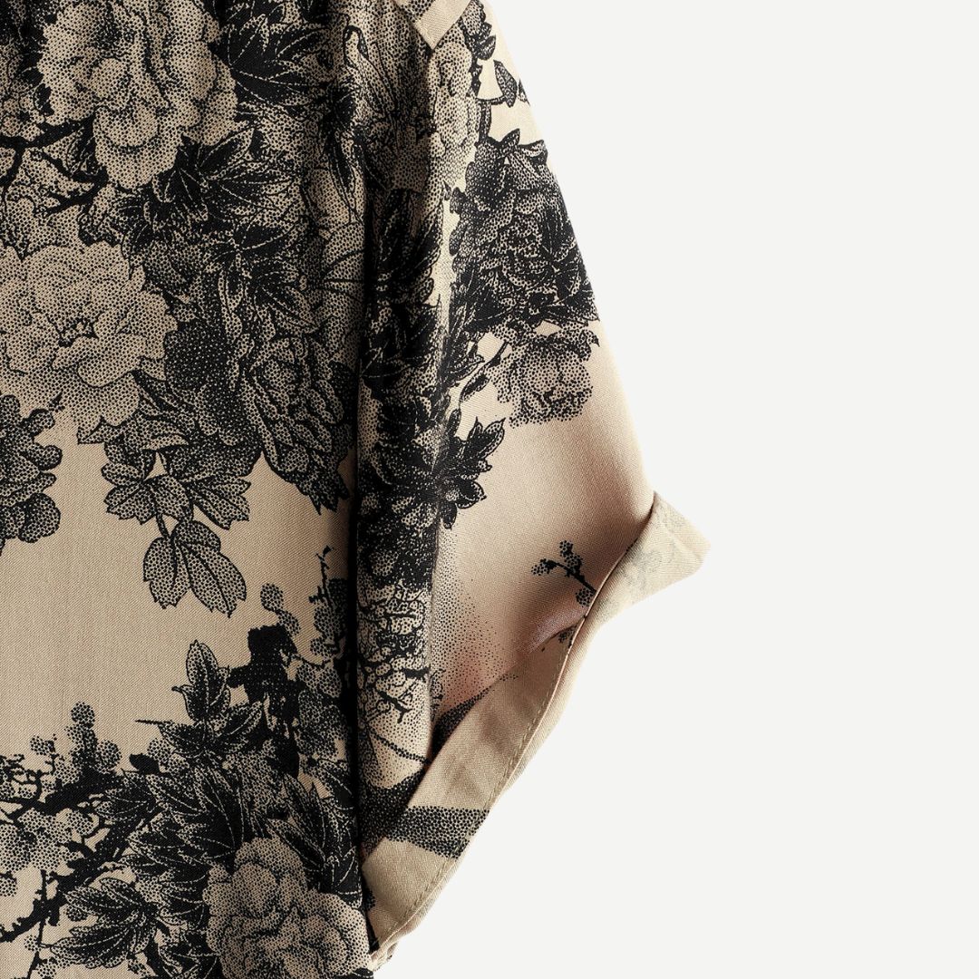 Men's beige short sleeve shirt with dark floral botanical print