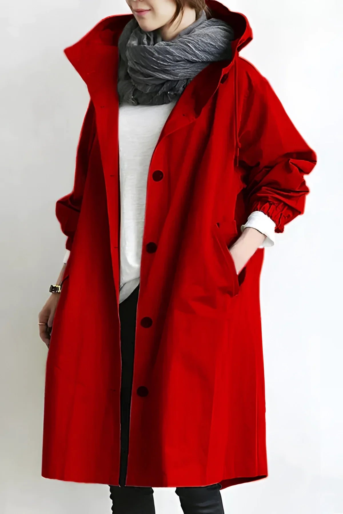 Women's long hooded trench coat with button front and gathered cuffs