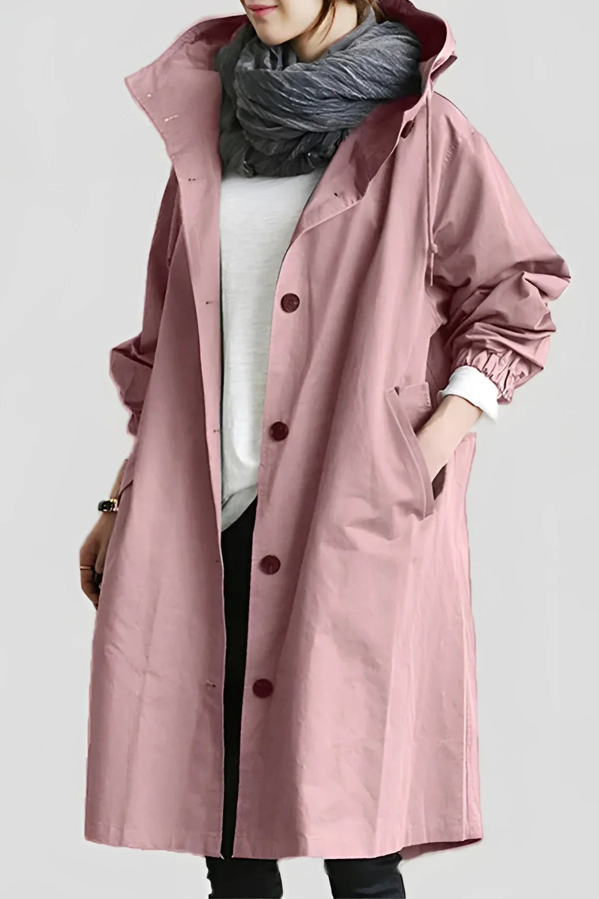 Women's long hooded trench coat with button front and gathered cuffs