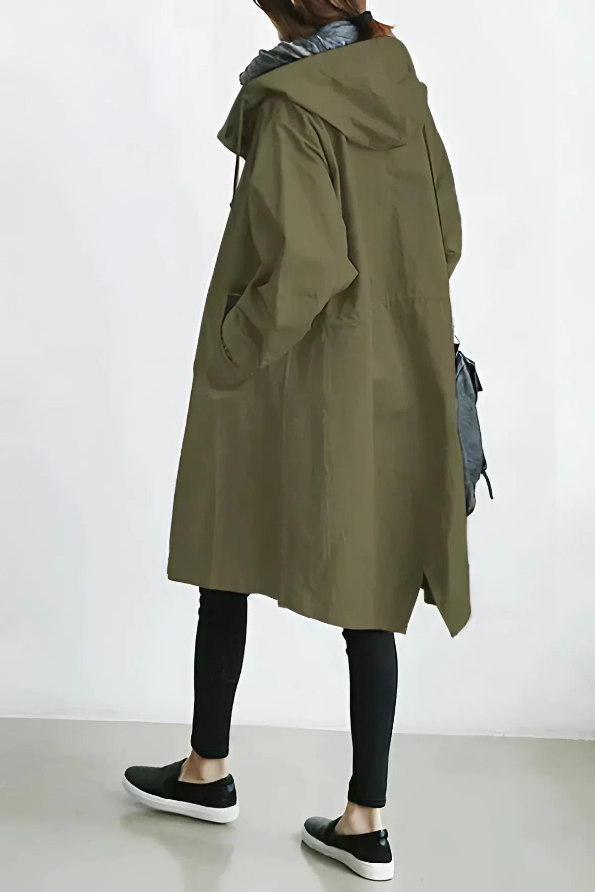 Women's long hooded trench coat with button front and gathered cuffs