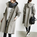 Women's long hooded trench coat with button front and gathered cuffs