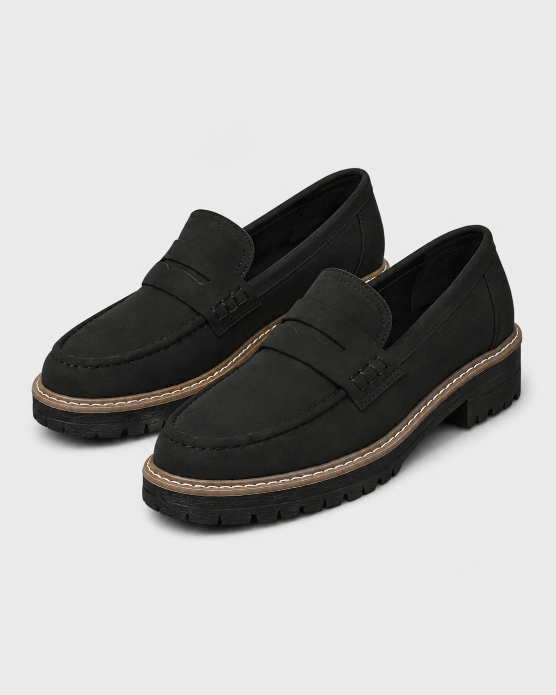 Women's slip-on loafers with penny straps, round toes and lug soles