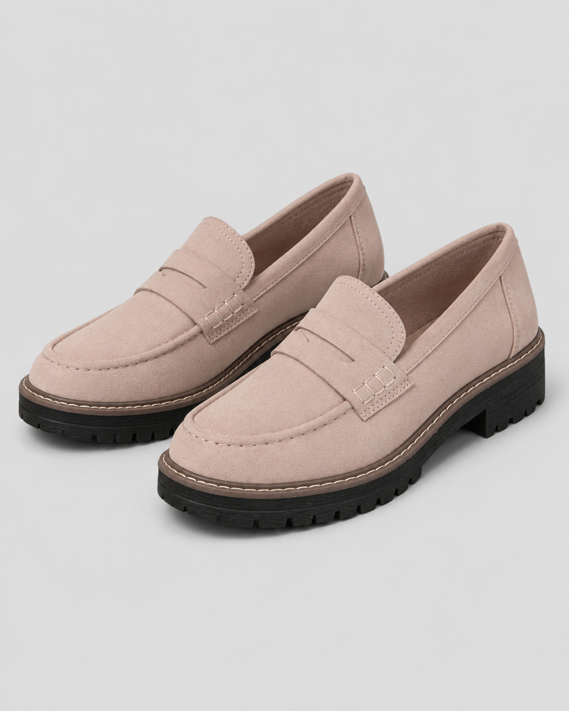Women's slip-on loafers with penny straps, round toes and lug soles