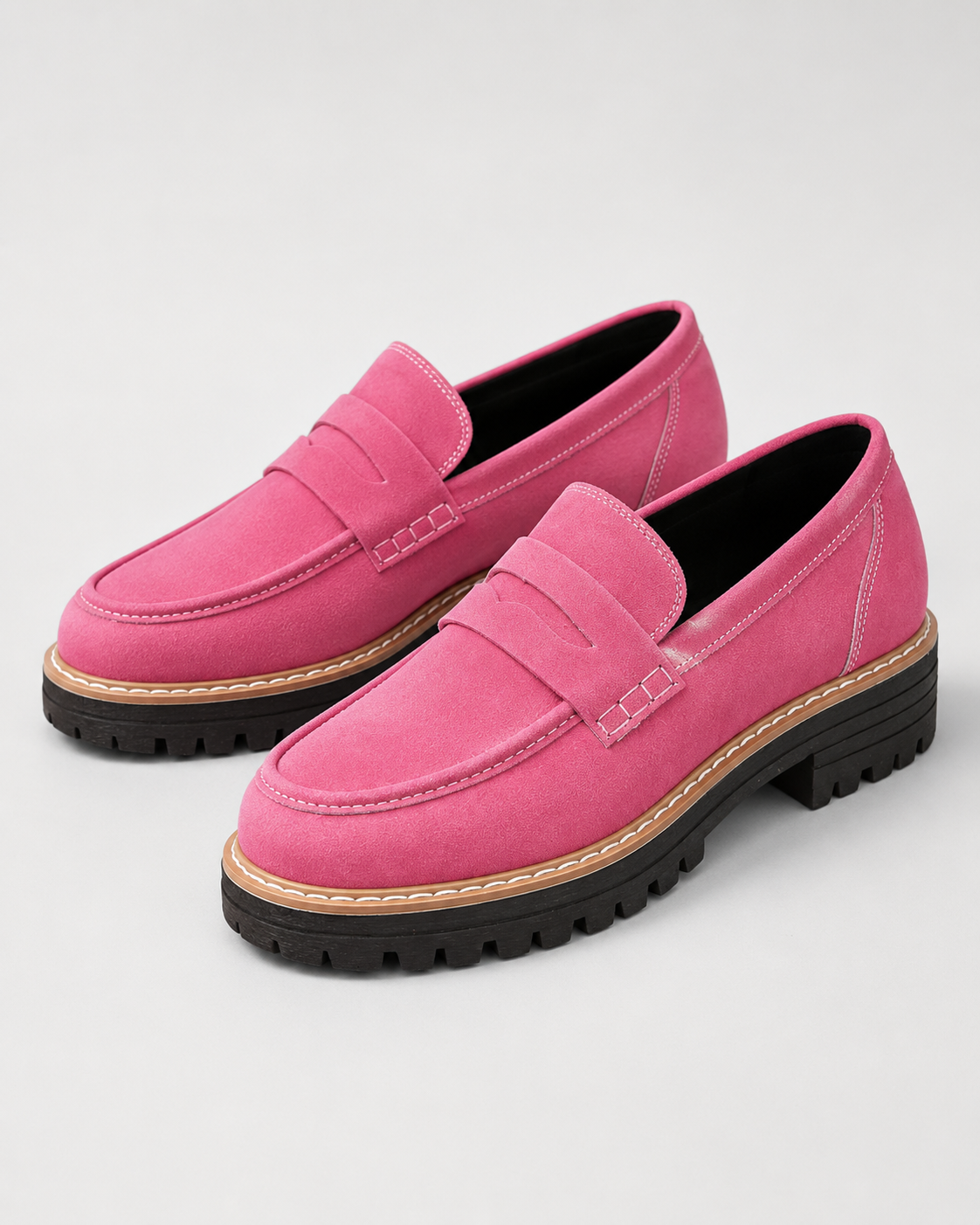 Women's slip-on loafers with penny straps, round toes and lug soles