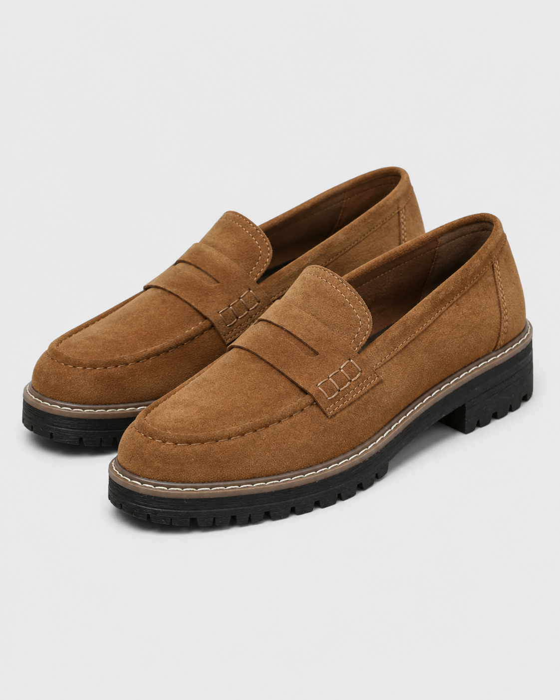 Women's slip-on loafers with penny straps, round toes and lug soles