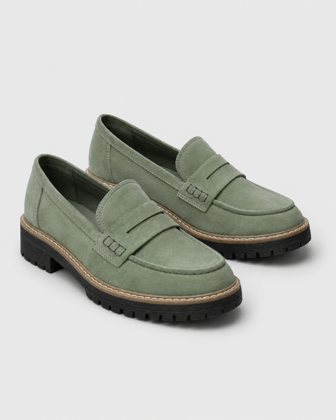 Women's slip-on loafers with penny straps, round toes and lug soles