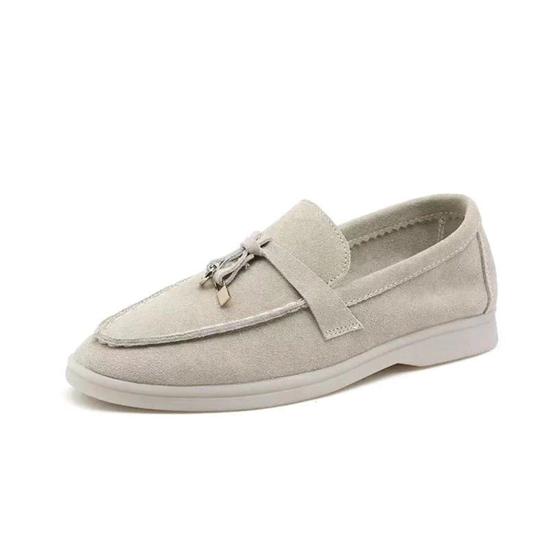 Women's slip-on loafers with almond toes, vamp straps and flat soles