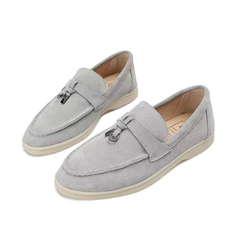 Women's slip-on loafers with almond toes, vamp straps and flat soles