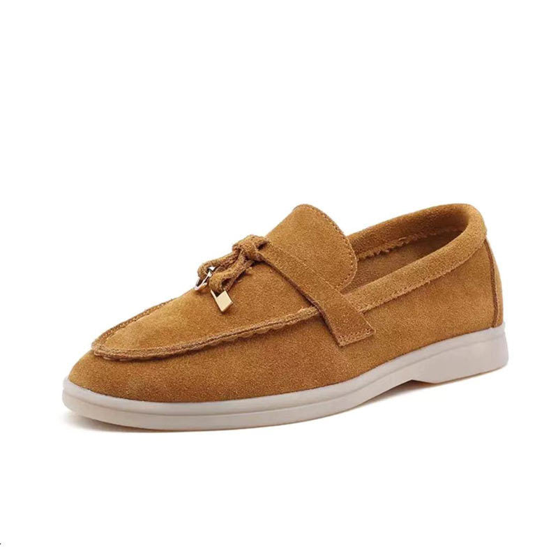 Women's slip-on loafers with almond toes, vamp straps and flat soles