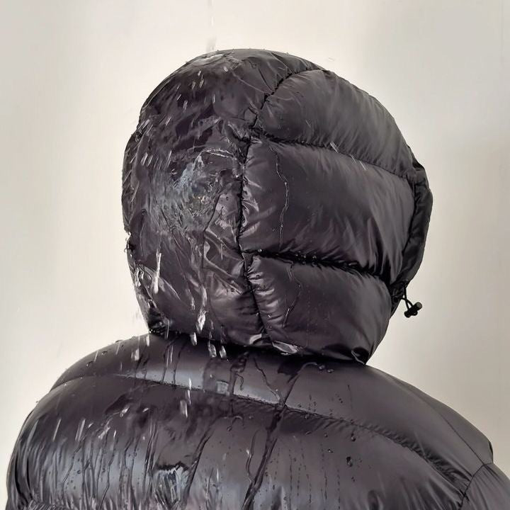 Men's hooded quilted puffer jacket with zip front and slanted pockets