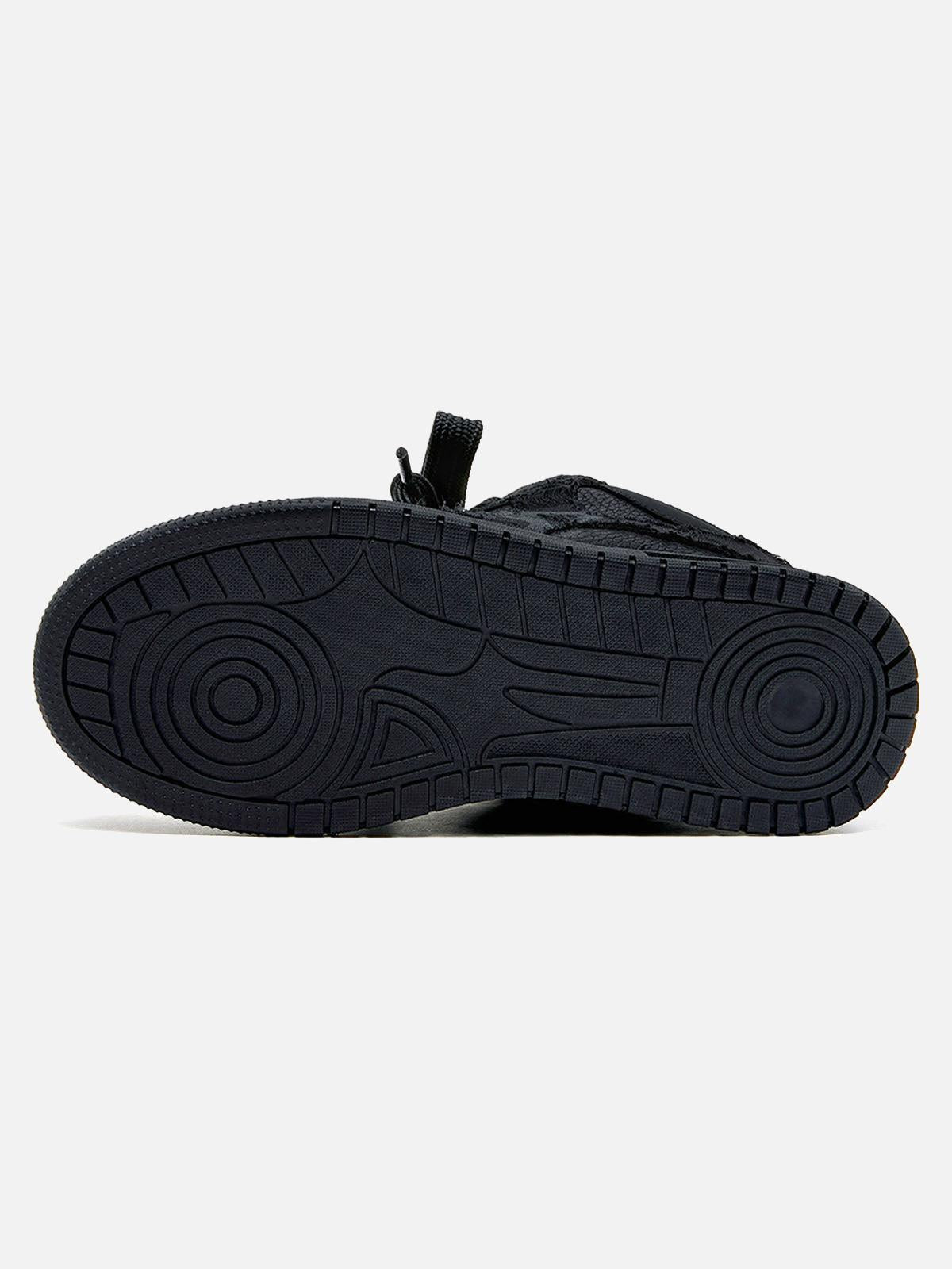 Black high-top skate trainers with lace-up front and tonal camouflage side detail