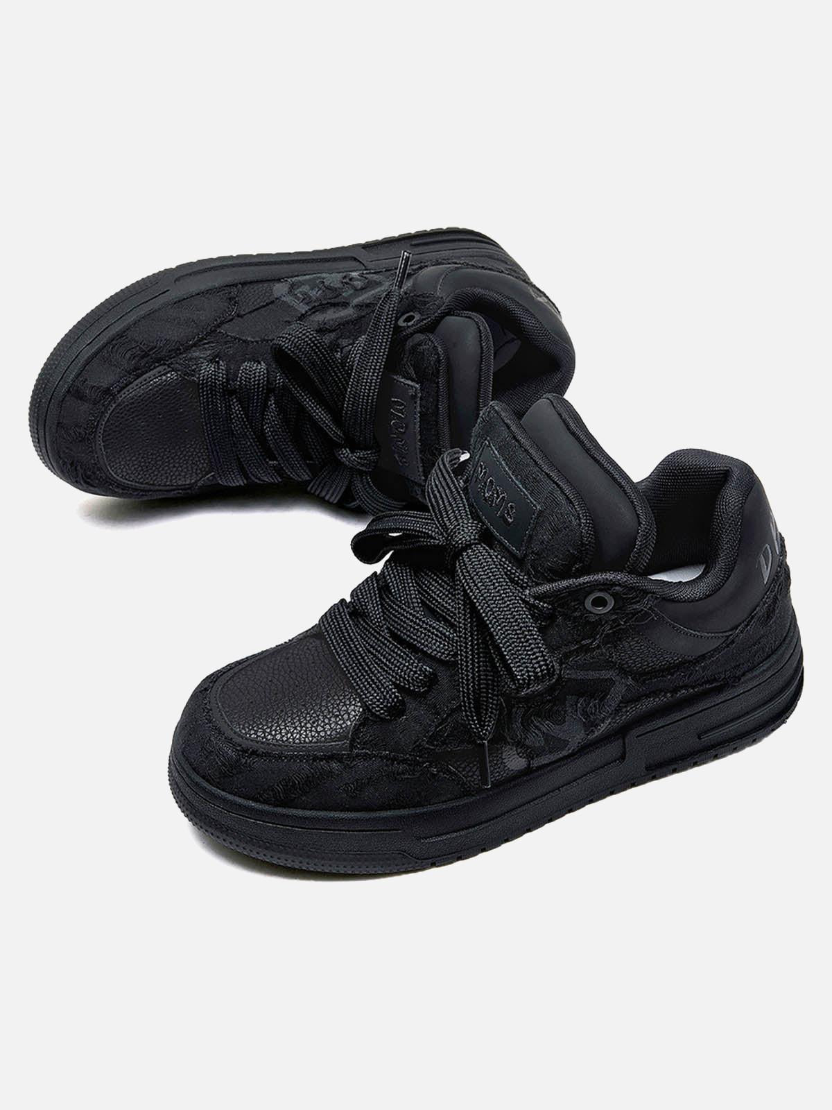 Black high-top skate trainers with lace-up front and tonal camouflage side detail