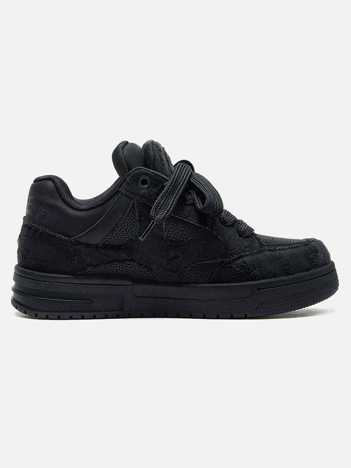 Black high-top skate trainers with lace-up front and tonal camouflage side detail