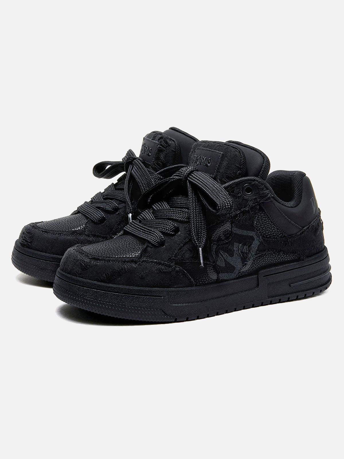 Black high-top skate trainers with lace-up front and tonal camouflage side detail